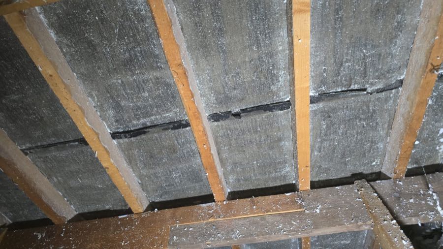 Roof void cleared of spray foam insulation, ready for re-roofing