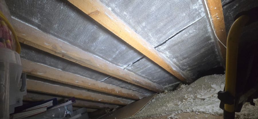 Spray foam insulation removed from roof rafters by MG SOURCE