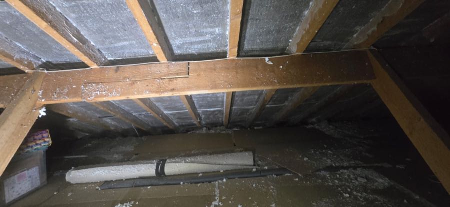 Roof void cleared of spray foam insulation, ready for re-roofing