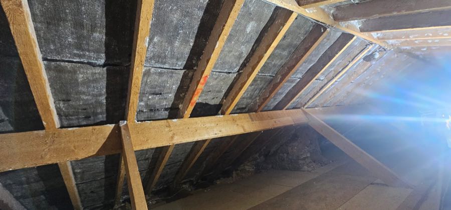 Completed spray foam removal leaving clean roof timbers ready for inspection